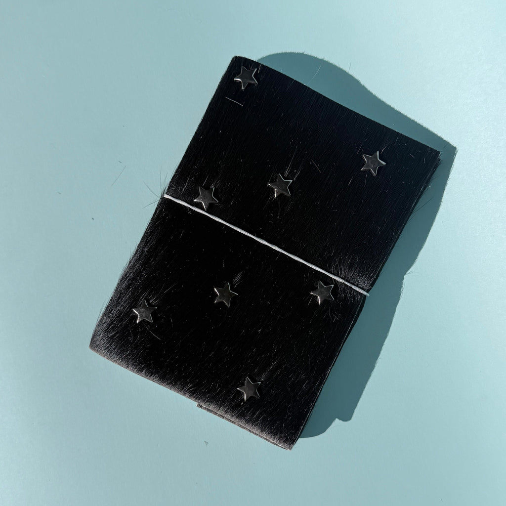 A6 // WILD PLUS ONE WITH GUNMETAL STARS